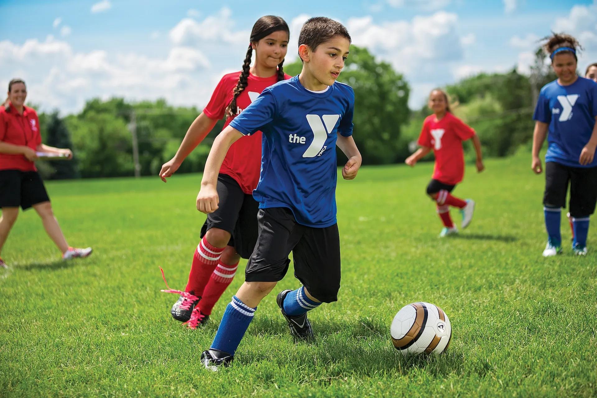 Kids playing youth soccer at the Y