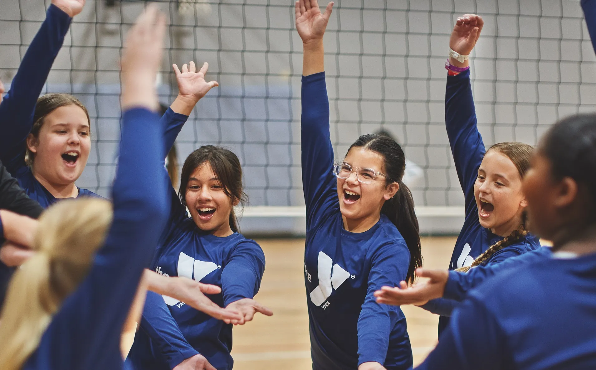 Kids playing volleyball at the YMCA