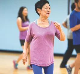 Senior woman exercising at the Y