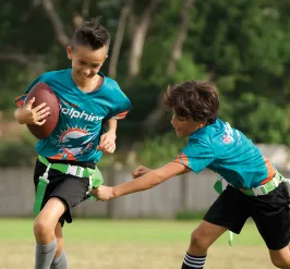 Kids playing NFL Flag Football at the Y