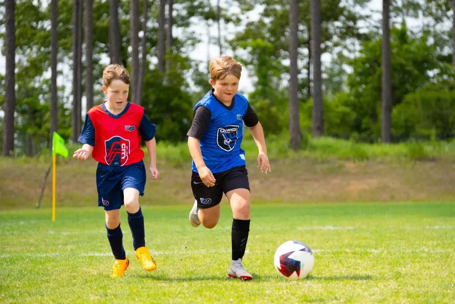 Two kids playing MLS GO Soccer