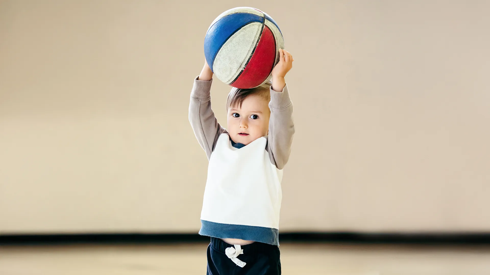 Preschooler with basketball