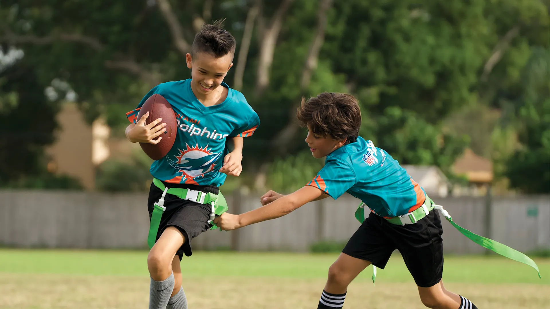 Kids playing NFL Flag Football at the Y